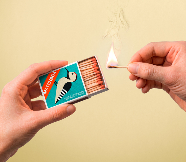 Hand Holding Matchbox Ignition Scene PSD Mockup