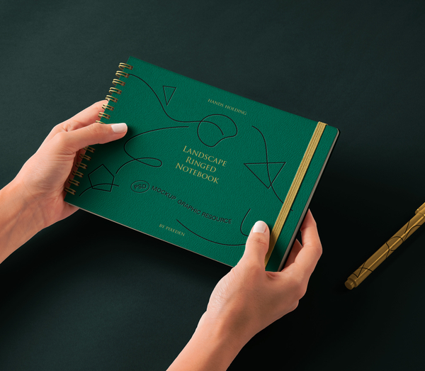 Hand Holding Ringed Psd Notebook Mockup